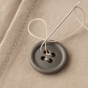 Przyszycie guzika (cena bez guzika)